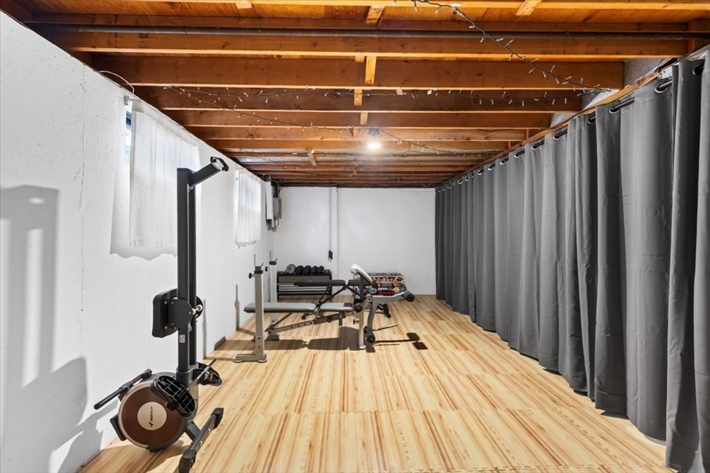 104 Newcomb Street, Unit E Norton, MA 02766 - Photo 12 of 21 a view of deck with patio