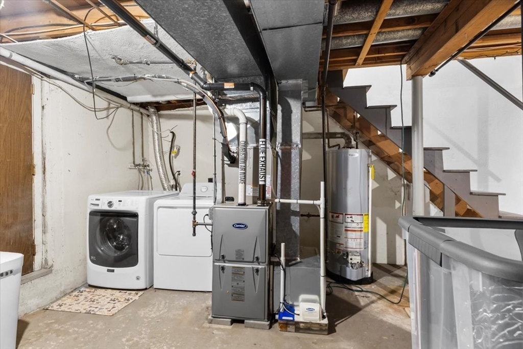 104 Newcomb Street, Unit E Norton, MA 02766 - Photo 15 of 21 a utility room with dryer and washer