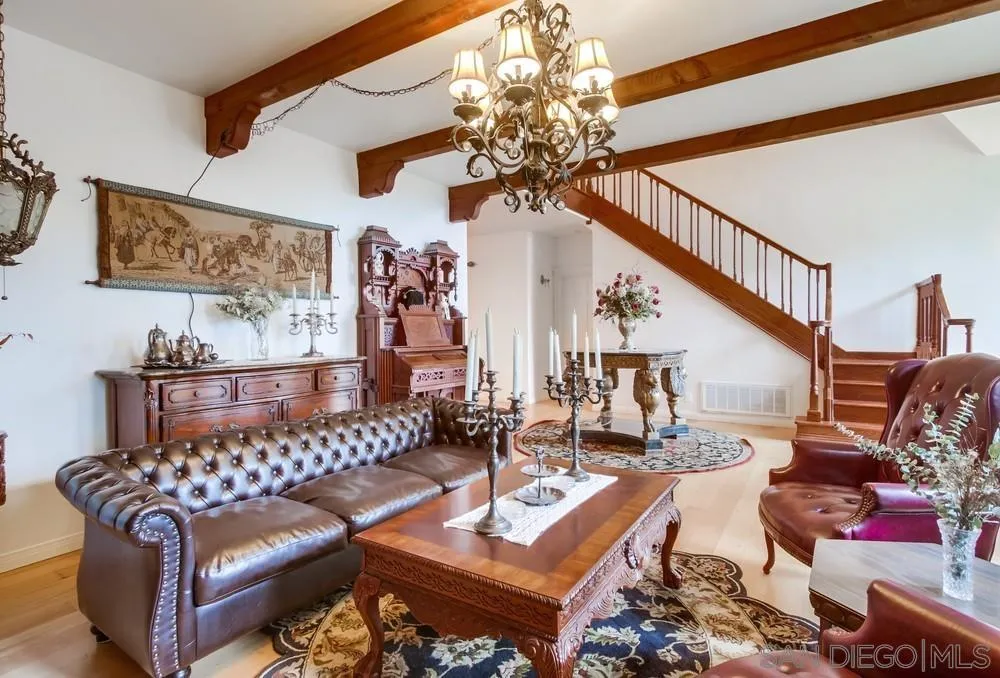 4499 Toyon Mountain Road Julian, CA 92036 - Photo 16 of 50 a living room with furniture and a chandelier
