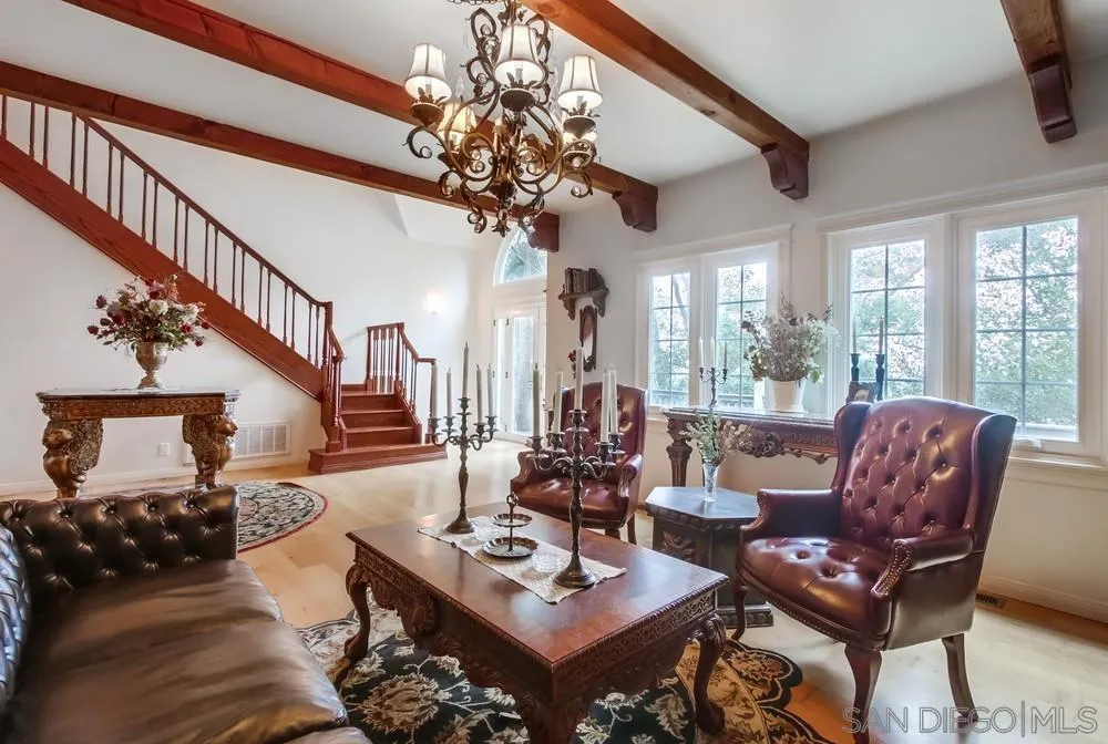 4499 Toyon Mountain Road Julian, CA 92036 - Photo 17 of 50 a living room with furniture a chandelier and a dining table