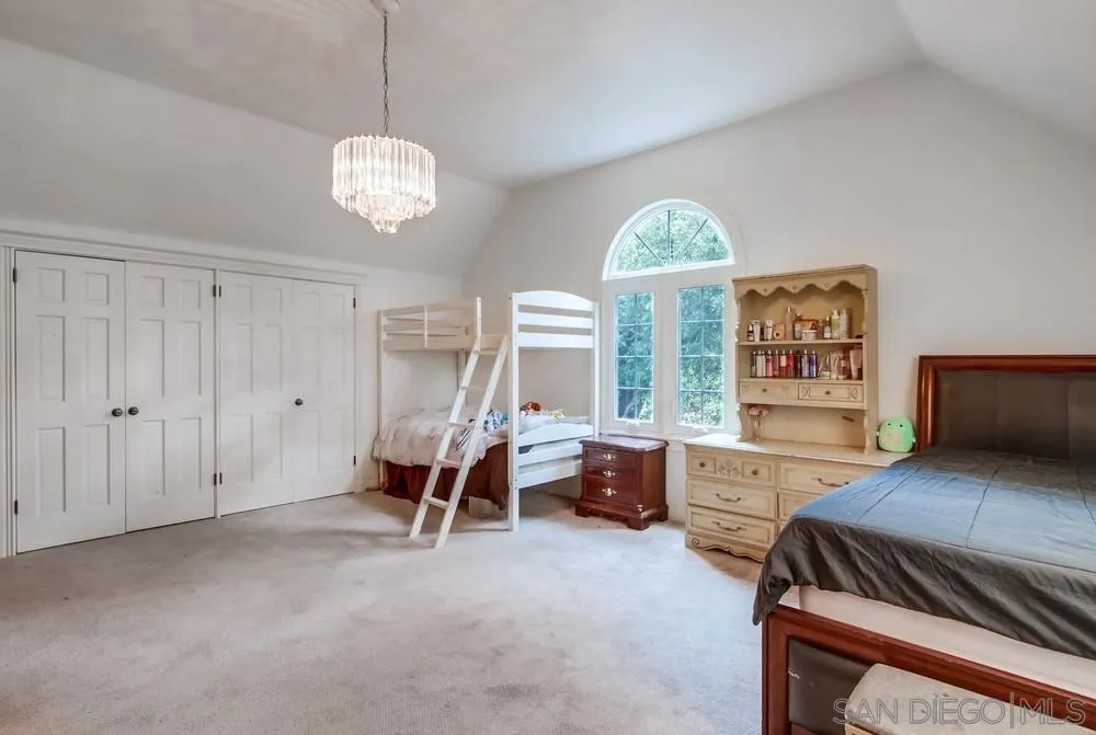 4499 Toyon Mountain Road Julian, CA 92036 - Photo 29 of 50 a bedroom with bed and window