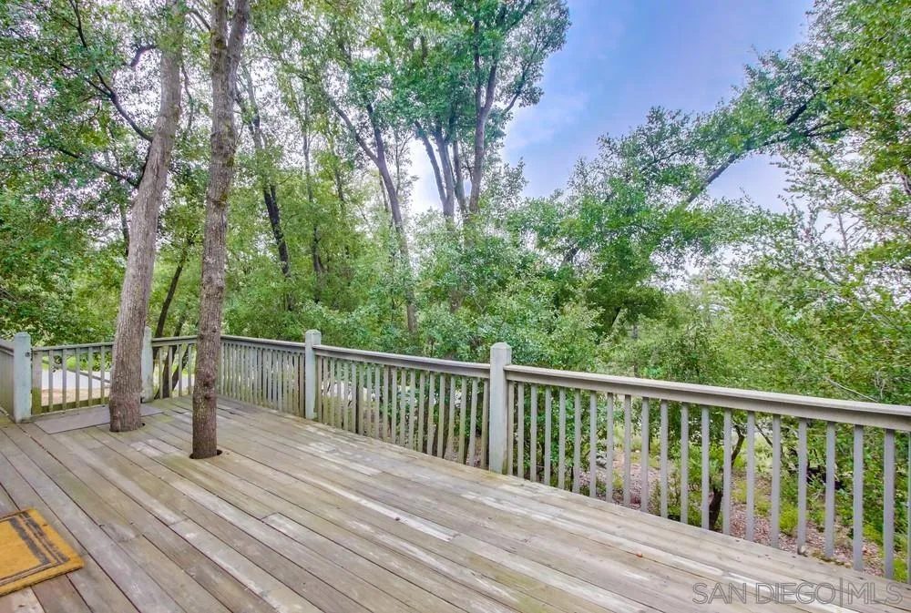 4499 Toyon Mountain Road Julian, CA 92036 - Photo 44 of 50 a view of a wooden deck and a yard with wooden fence