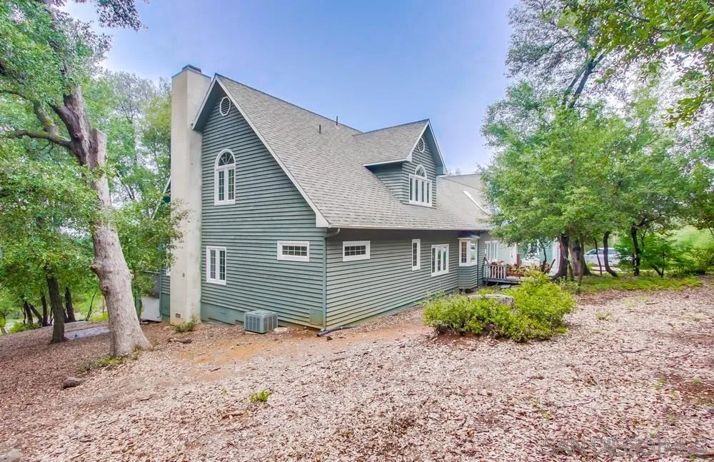 4499 Toyon Mountain Road Julian, CA 92036 - Photo 48 of 50 a front view of a house with a yard and garage