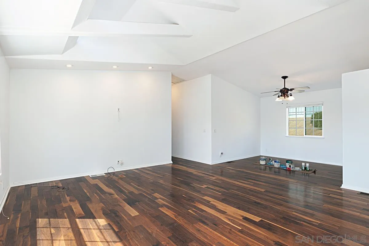 1064 Ranchito Vista Alpine, CA 91901 - Photo 11 of 31 a view of empty room with wooden floor and fan