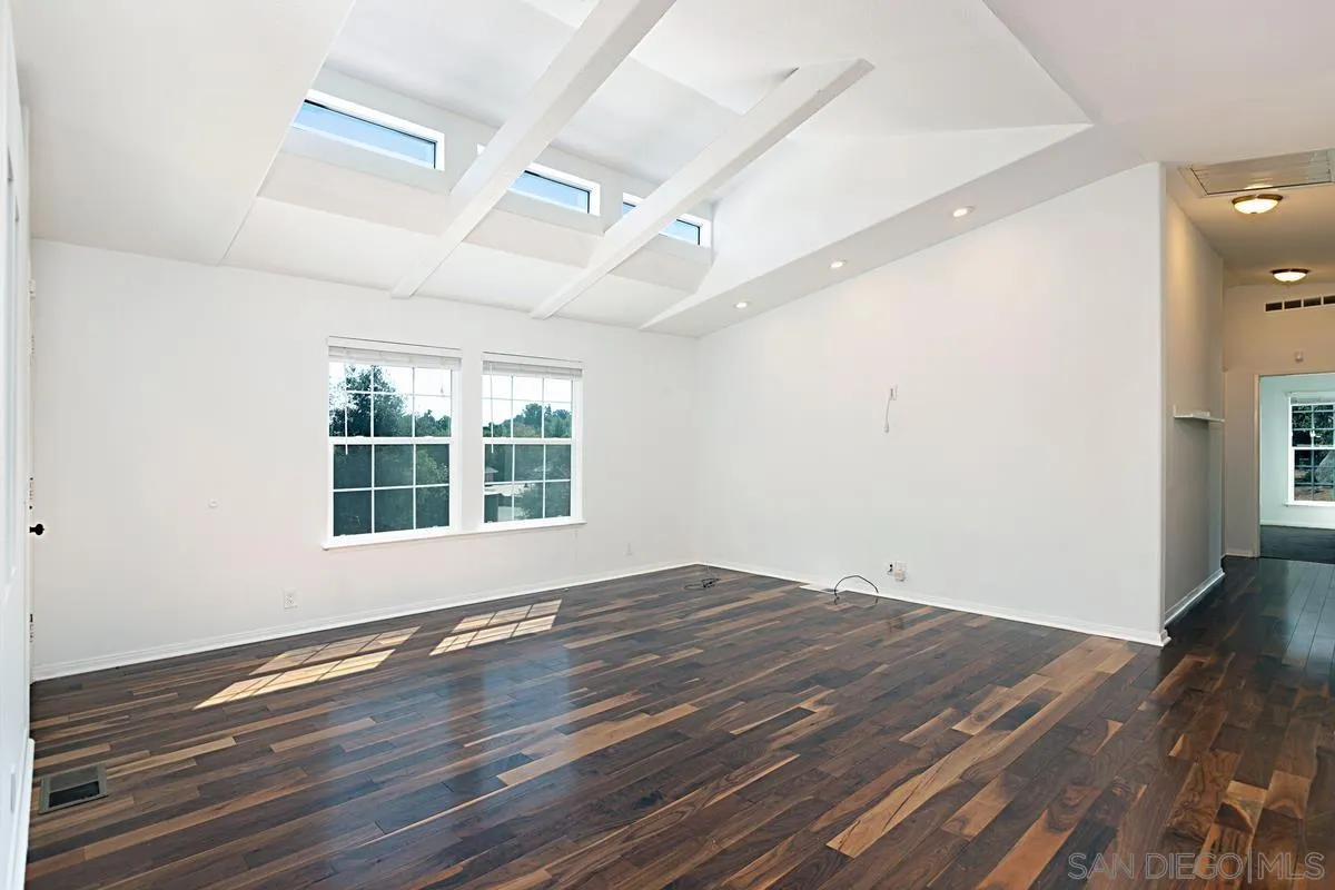 1064 Ranchito Vista Alpine, CA 91901 - Photo 13 of 31 wooden floor in an empty room with a window