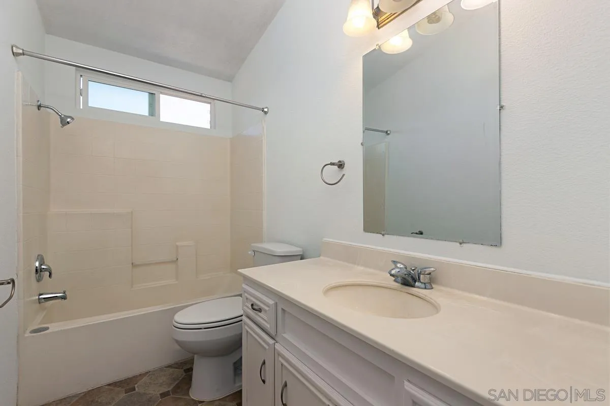 1064 Ranchito Vista Alpine, CA 91901 - Photo 26 of 31 a bathroom with a granite countertop sink toilet and shower