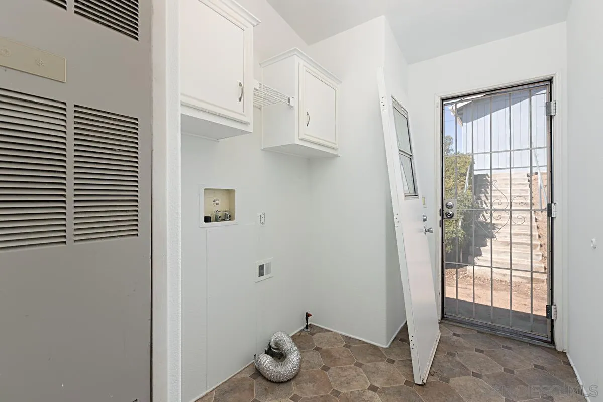 1064 Ranchito Vista Alpine, CA 91901 - Photo 28 of 31 a view of small space with wooden floor and a window