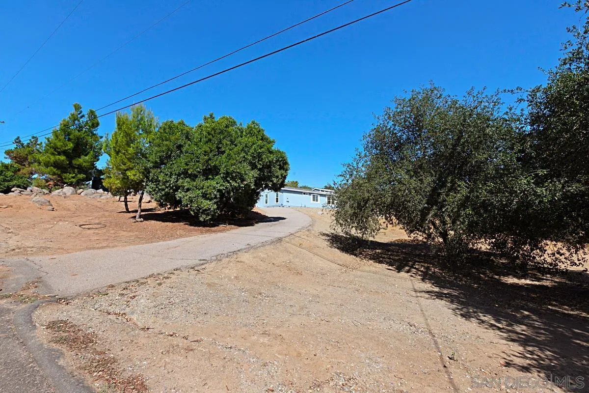 1064 Ranchito Vista Alpine, CA 91901 - Photo 8 of 31 a view of a road with a yard