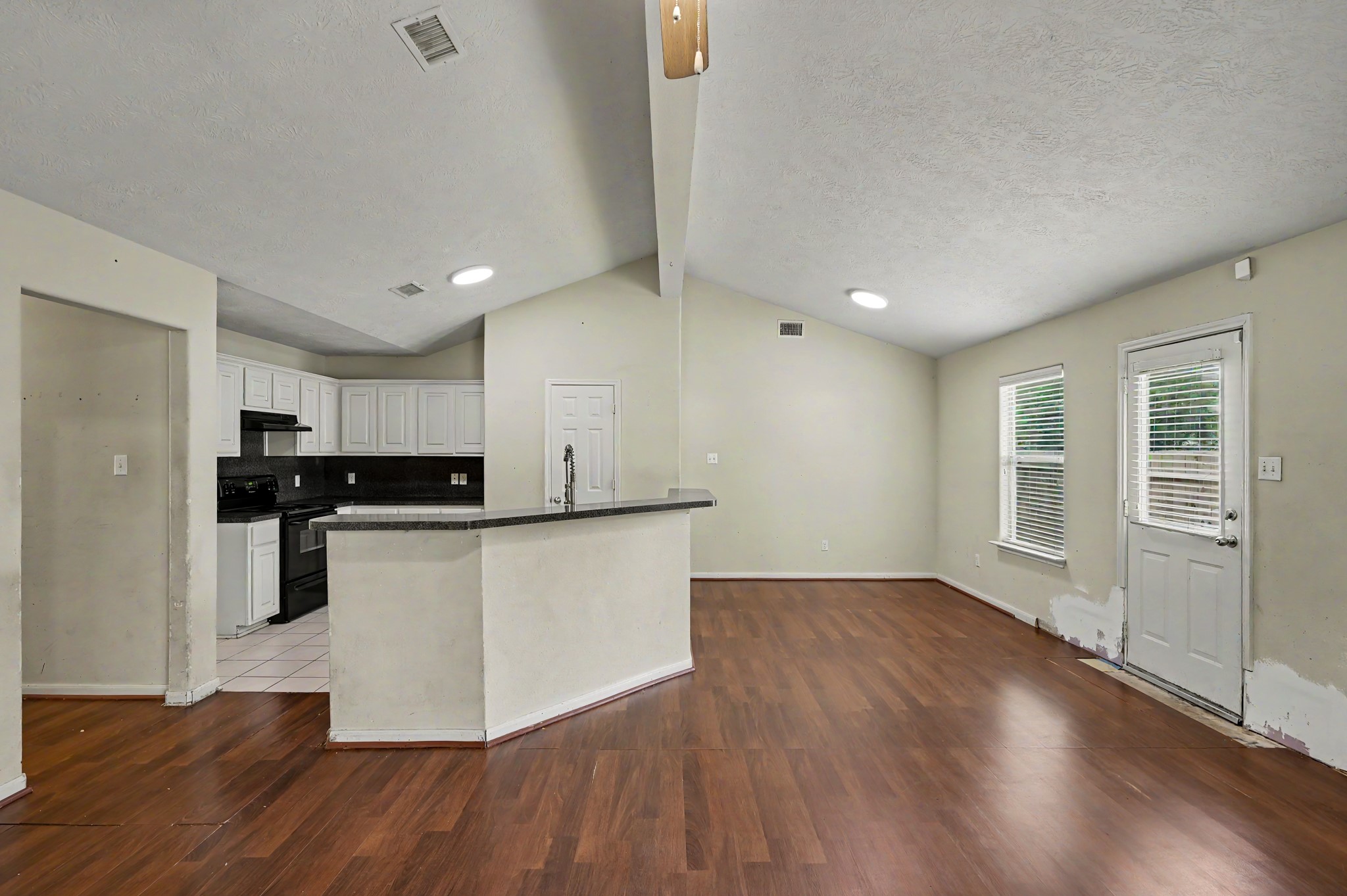 4619 Comal River Loop Spring, TX 77386 - Photo 4 of 16 This home feels light and bright with a door to the right leading to your spacious backyard.