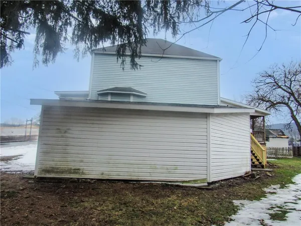a view of backyard of house