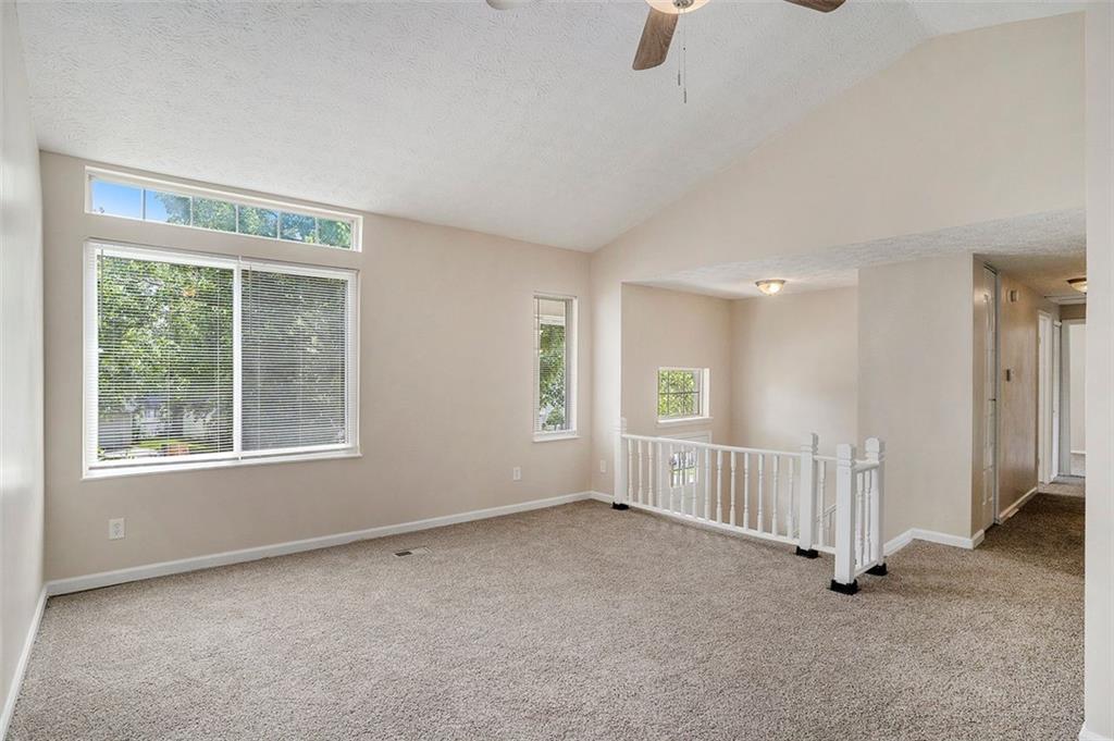 2039 Raintree Place Lithonia, GA 30058 - Photo 11 of 18 an empty room with windows