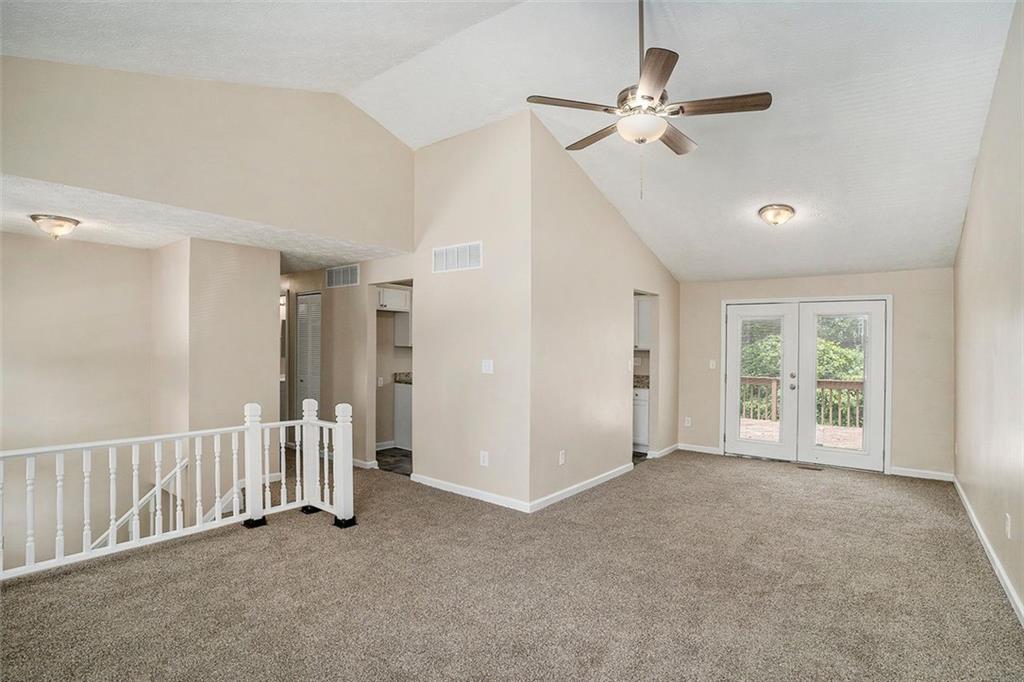 2039 Raintree Place Lithonia, GA 30058 - Photo 12 of 18 a view of an empty room with a window