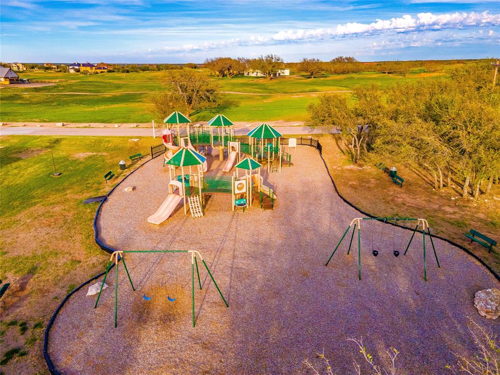 525 Cypress Point Graford, TX 76449 - Photo 21 of 23 a view of a swimming pool with an ocean view