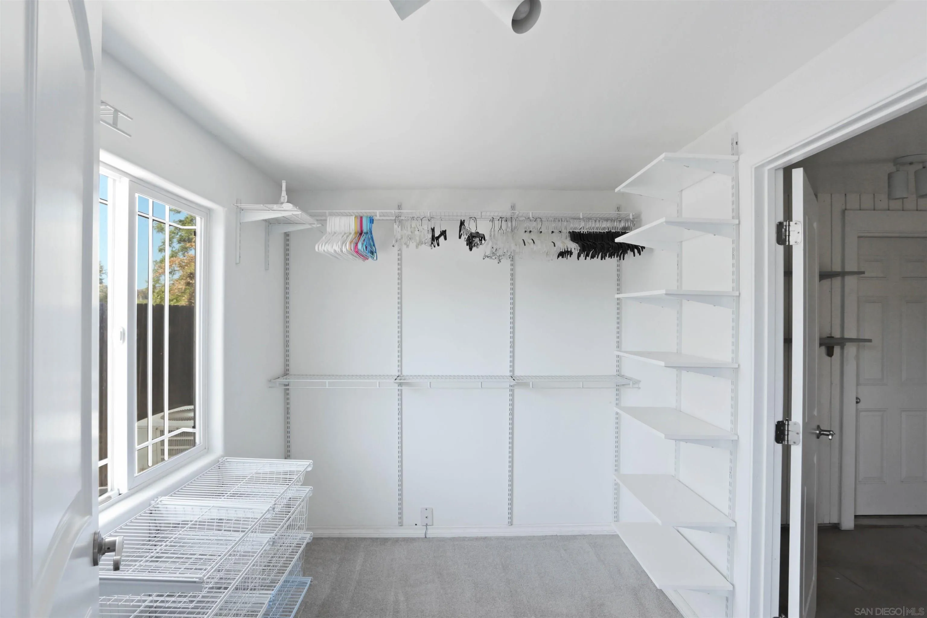 14287 Lolin Lane Poway, CA 92064 - Photo 17 of 35 a view of walk in closet