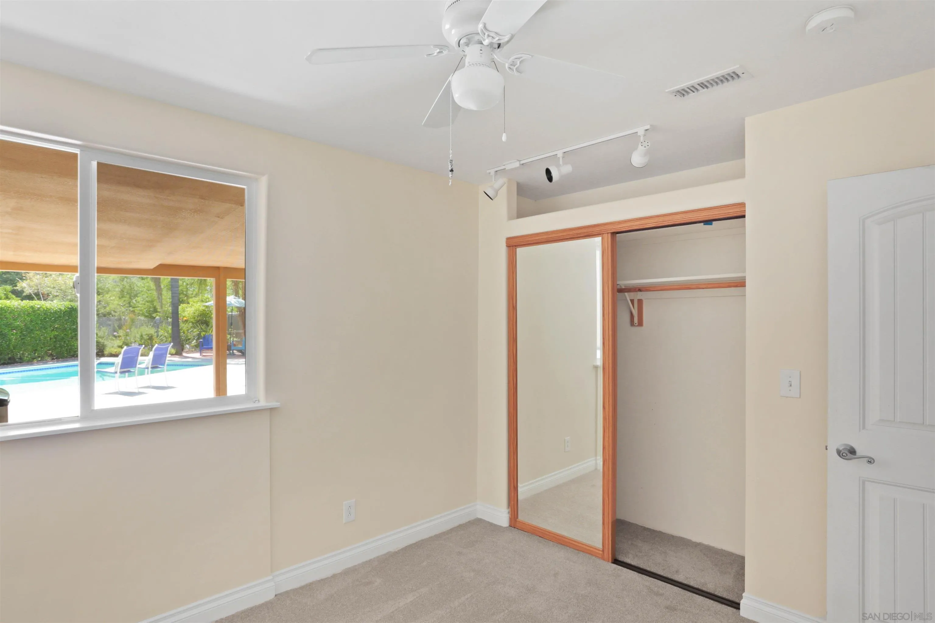 14287 Lolin Lane Poway, CA 92064 - Photo 20 of 35 a view of an empty room with a window