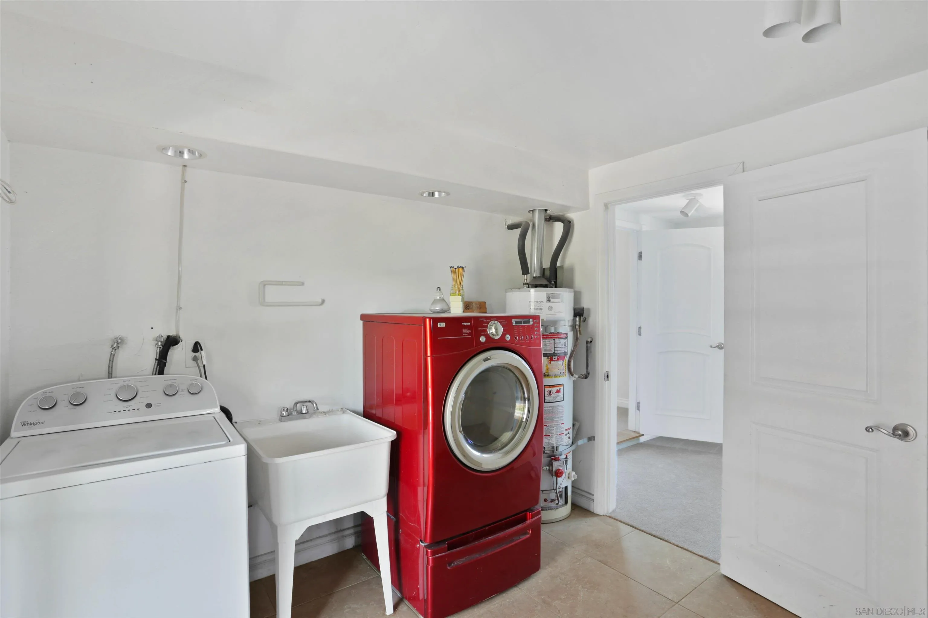 14287 Lolin Lane Poway, CA 92064 - Photo 23 of 35 a utility room with dryer and washer