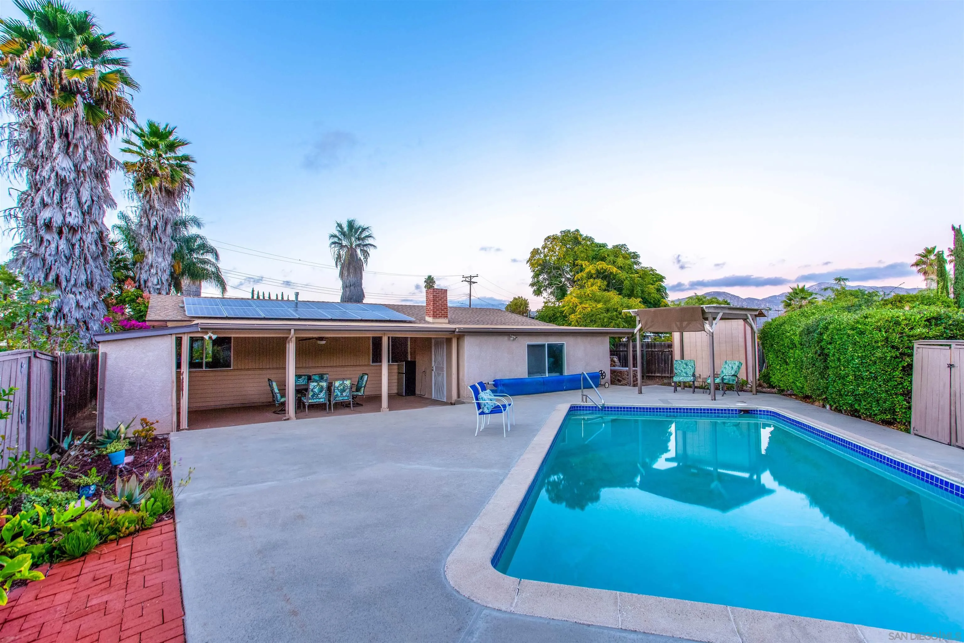 14287 Lolin Lane Poway, CA 92064 - Photo 26 of 35 a view of a house with swimming pool