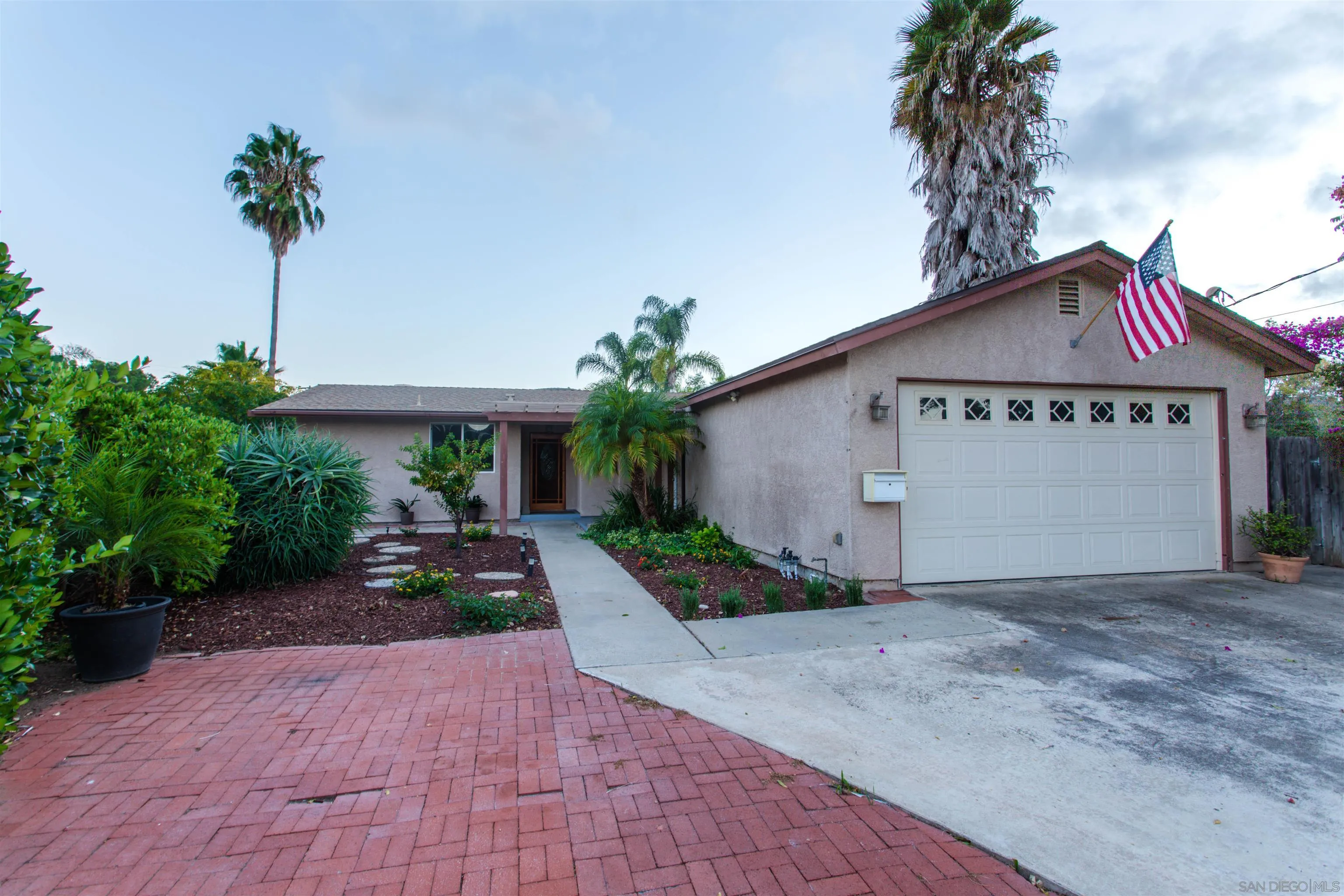 14287 Lolin Lane Poway, CA 92064 - Photo 3 of 35 a front view of a house with garden