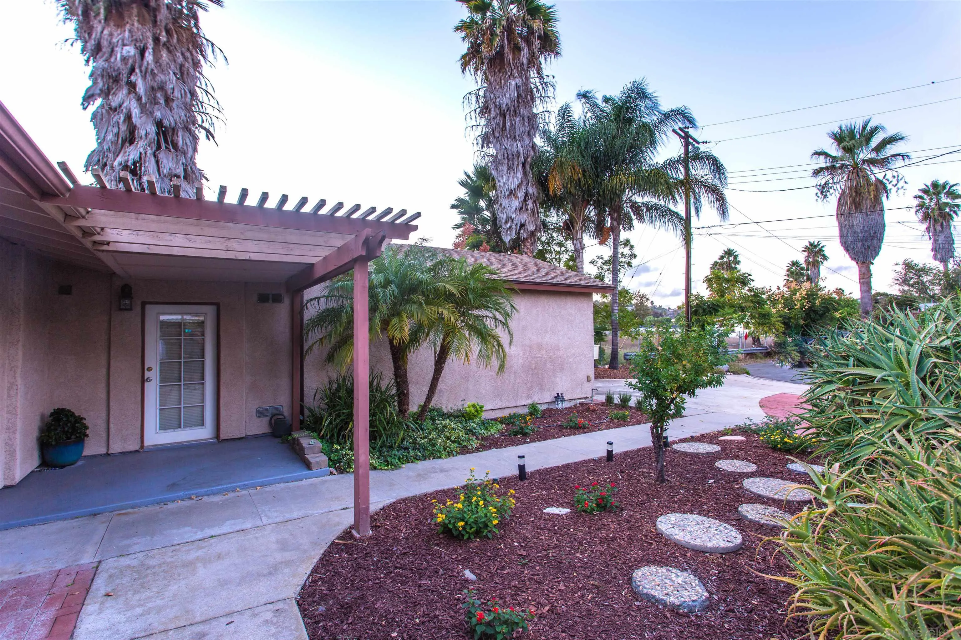 14287 Lolin Lane Poway, CA 92064 - Photo 4 of 35 a view of a house with a yard
