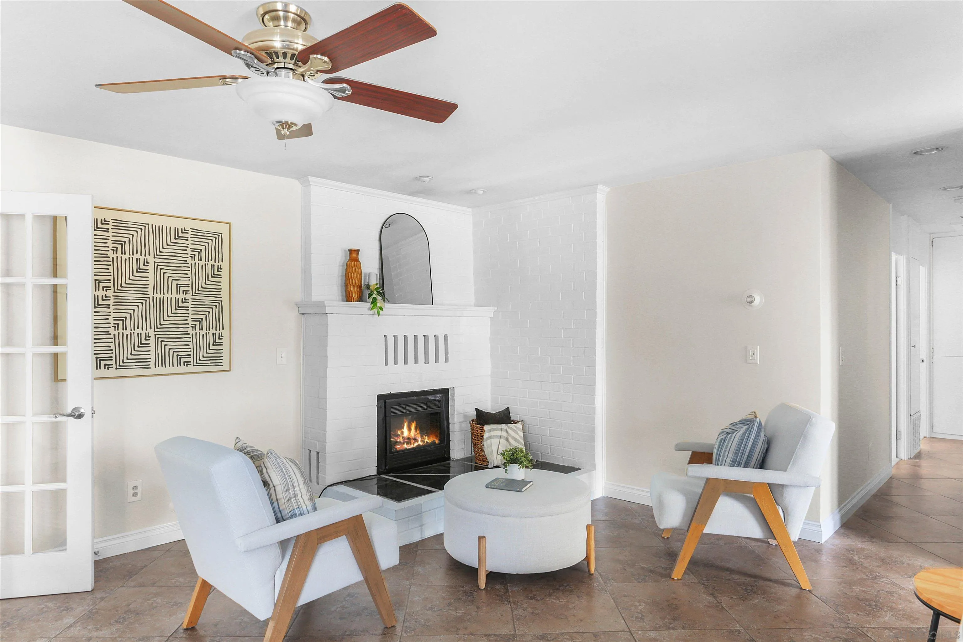 14287 Lolin Lane Poway, CA 92064 - Photo 5 of 35 a living room with furniture a flat screen tv and a fireplace