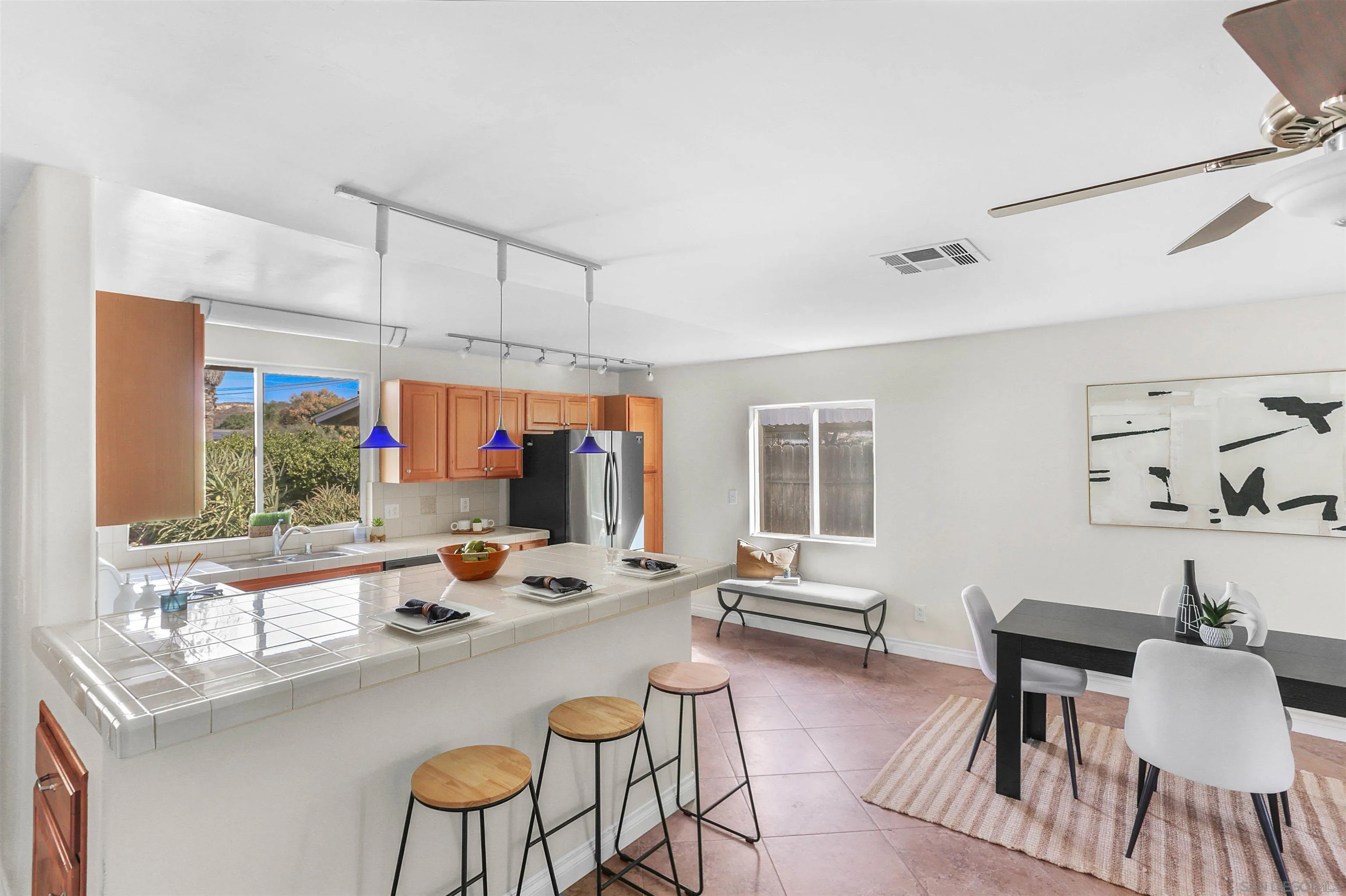 14287 Lolin Lane Poway, CA 92064 - Photo 10 of 35 a sitting area with furniture and large windows