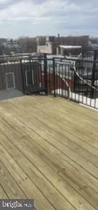 a view of a balcony with an ocean