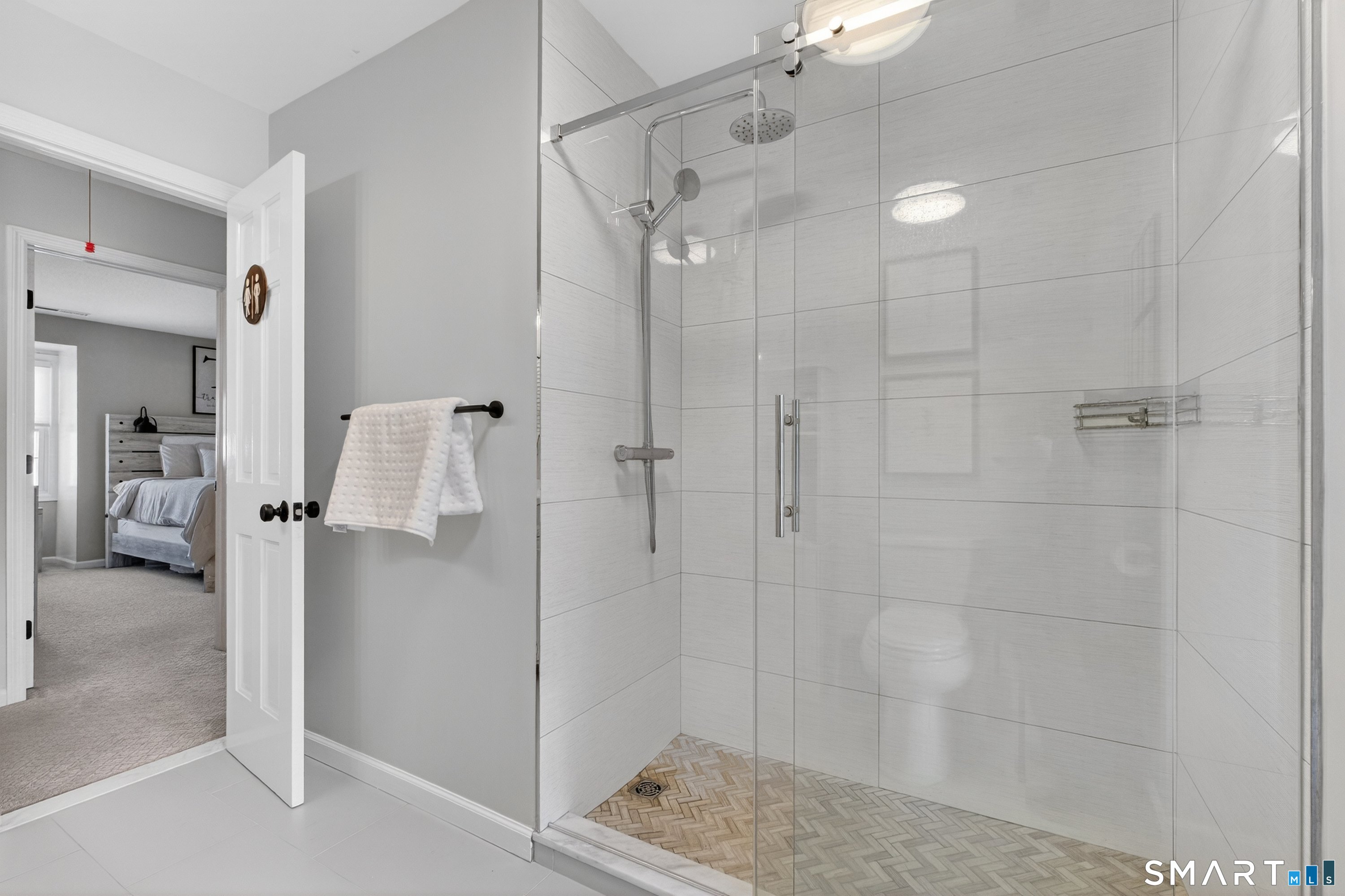 19 Prospect Ridge, Unit 41 Ridgefield, CT 06877 - Photo 23 of 29 a bathroom with a shower and a sink