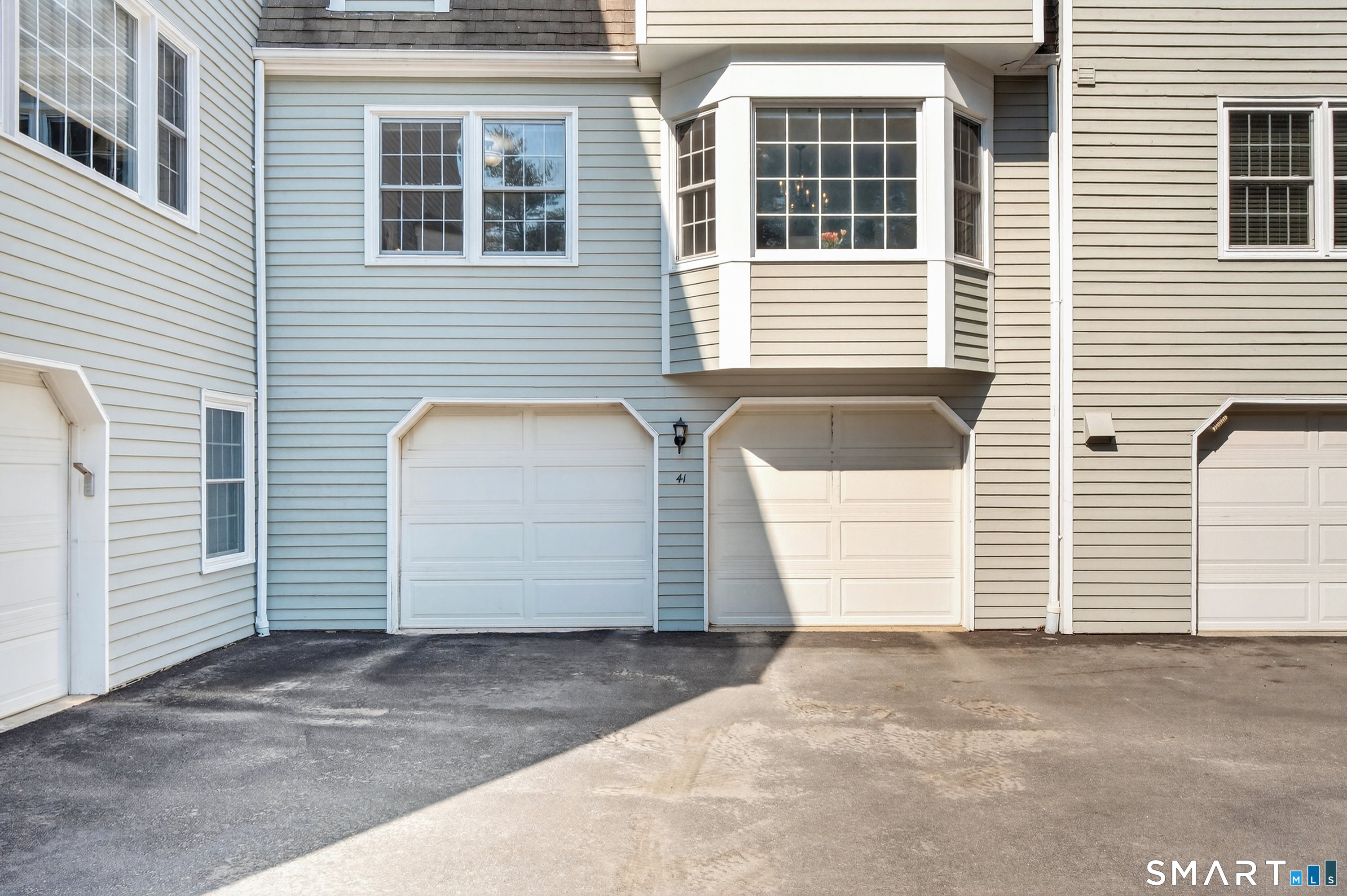 19 Prospect Ridge, Unit 41 Ridgefield, CT 06877 - Photo 26 of 29 a view of a house with parking space in front of a house