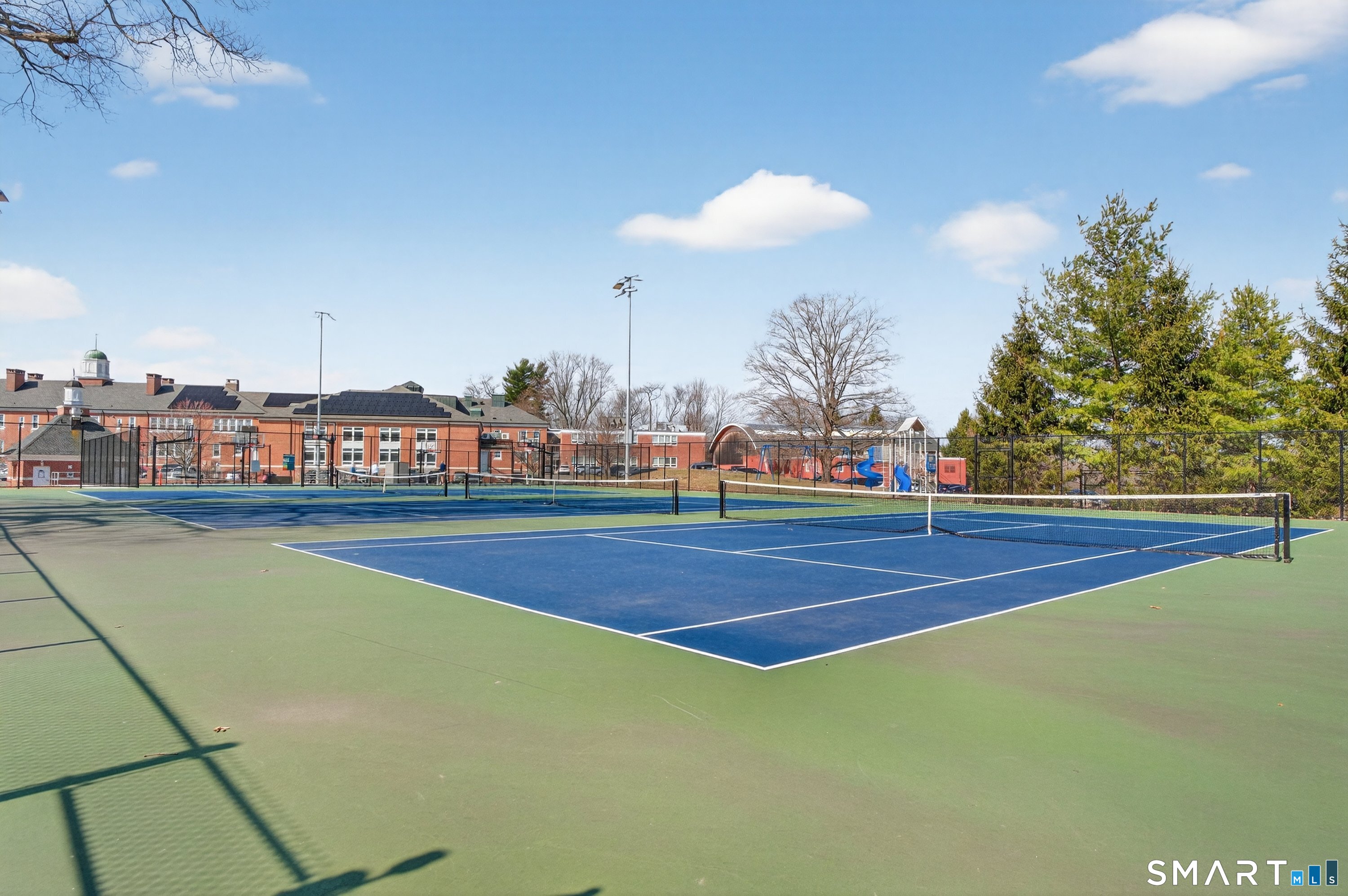 19 Prospect Ridge, Unit 41 Ridgefield, CT 06877 - Photo 29 of 29 a view of an outdoor space and basketball court