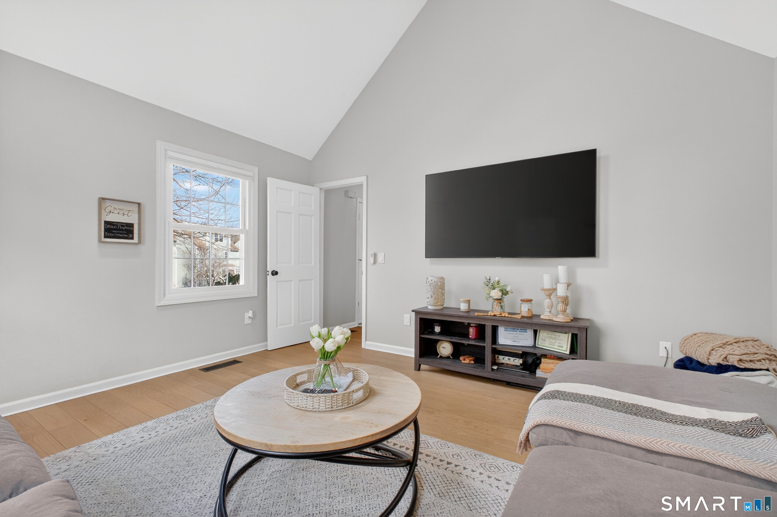 19 Prospect Ridge, Unit 41 Ridgefield, CT 06877 - Photo 7 of 29 a living room with furniture and a flat screen tv