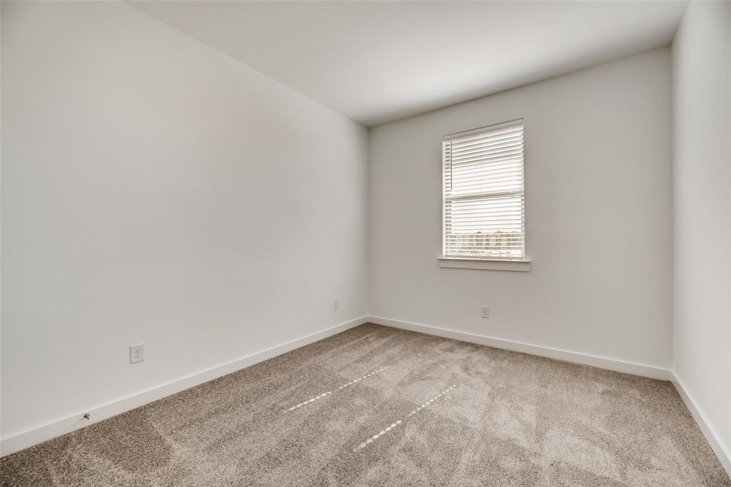 208 Venice Avenue Flower Mound, TX 75028 - Photo 15 of 17 an empty room with a window