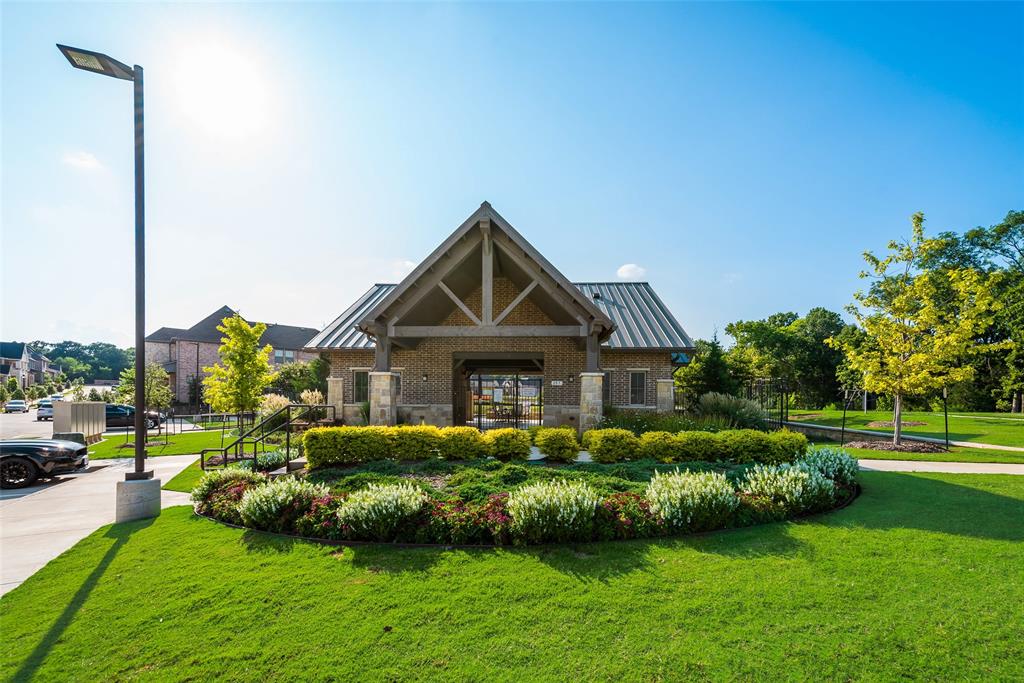 208 Venice Avenue Flower Mound, TX 75028 - Photo 16 of 17 a front view of a house with a yard table and chairs
