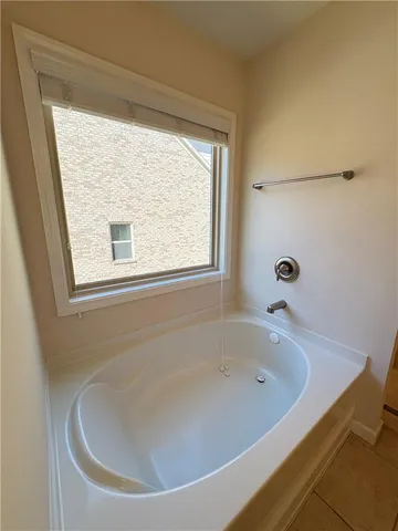 a bathroom with a bathtub