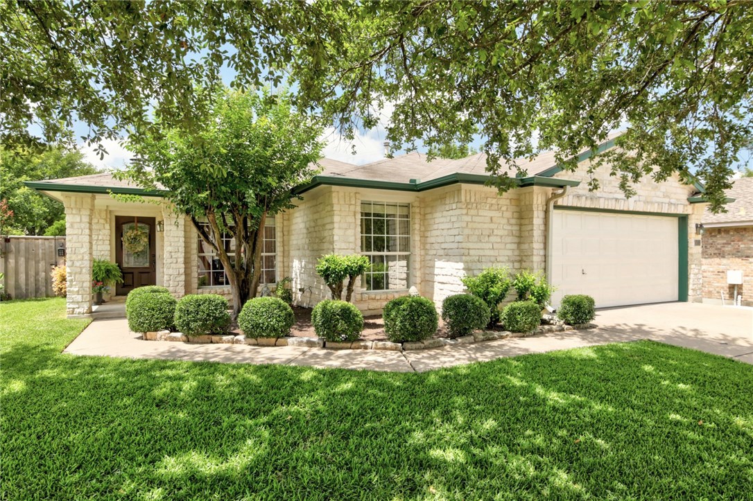 4201 Mocha Trail Austin, TX 78728 - Photo 1 of 1 a front view of a house with a yard
