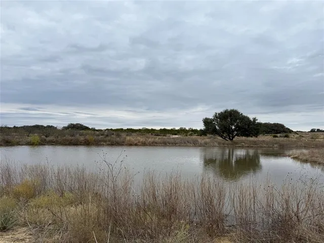 a view of lake with mountain