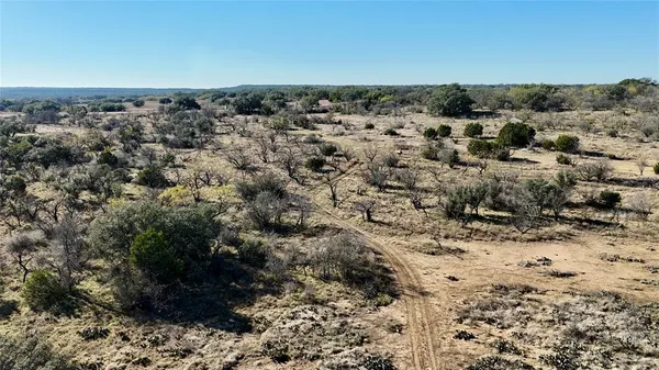 a room with furniture and a flat screen tv