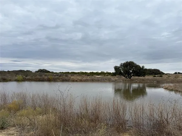 a view of lake with mountain