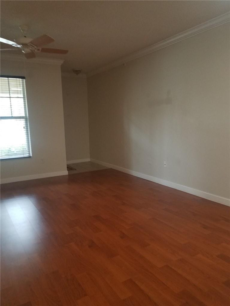 5880 West Sample Road, Unit 102 Coral Springs, FL 33067 - Photo 2 of 3 LIVING ROOM