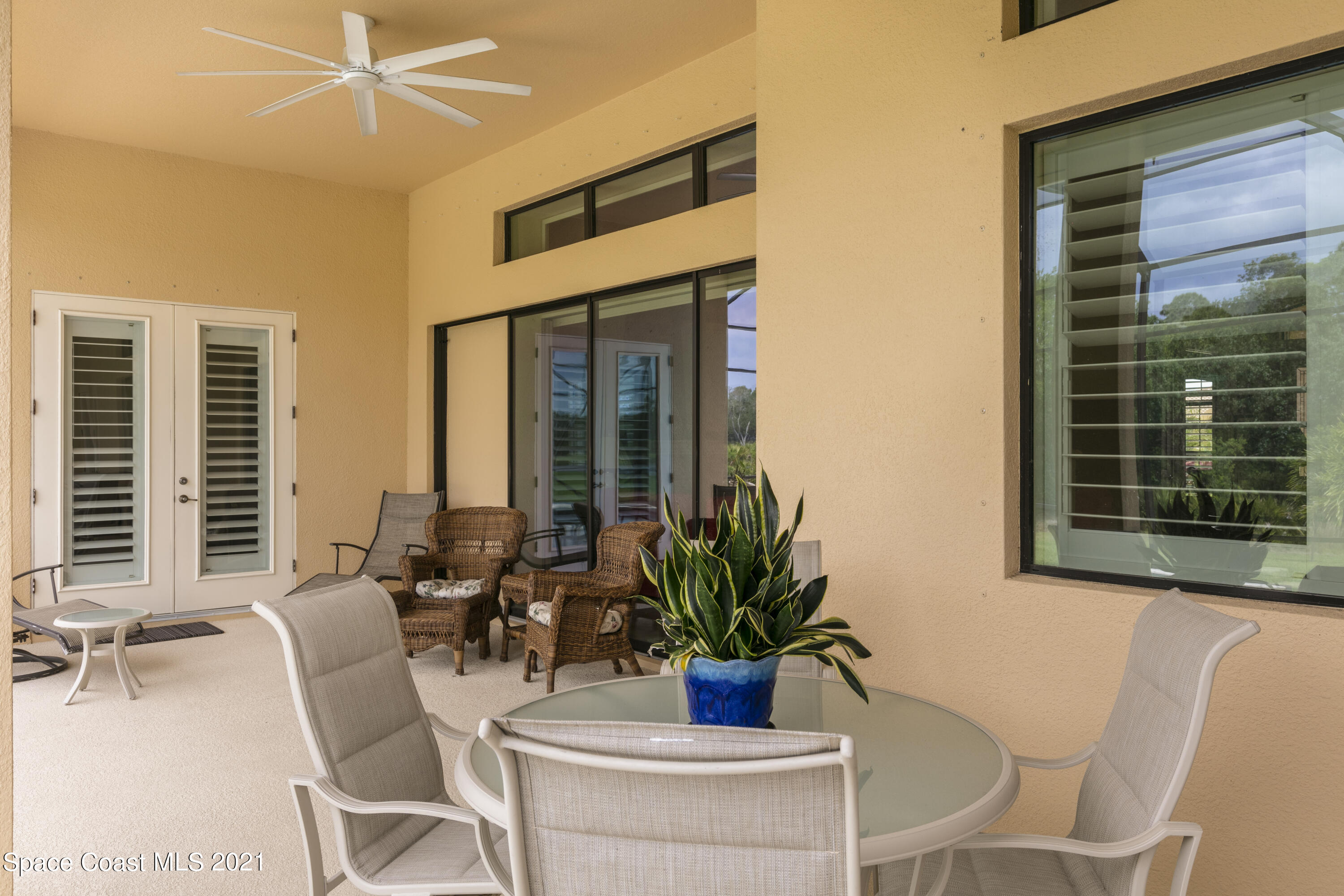 4584 Preservation Circle Melbourne, FL 32934 - Photo 18 of 34 a dining room with furniture and window