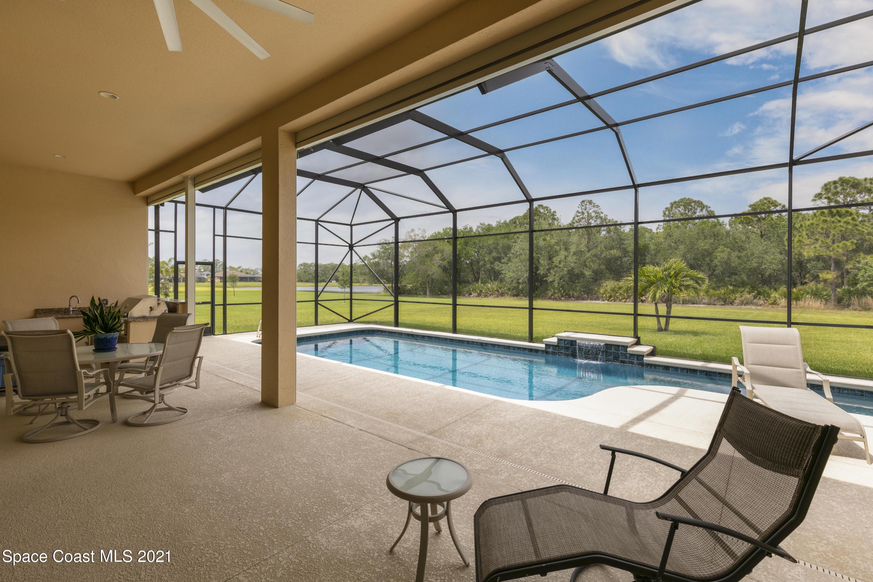 4584 Preservation Circle Melbourne, FL 32934 - Photo 21 of 34 a view of a patio with a backyard