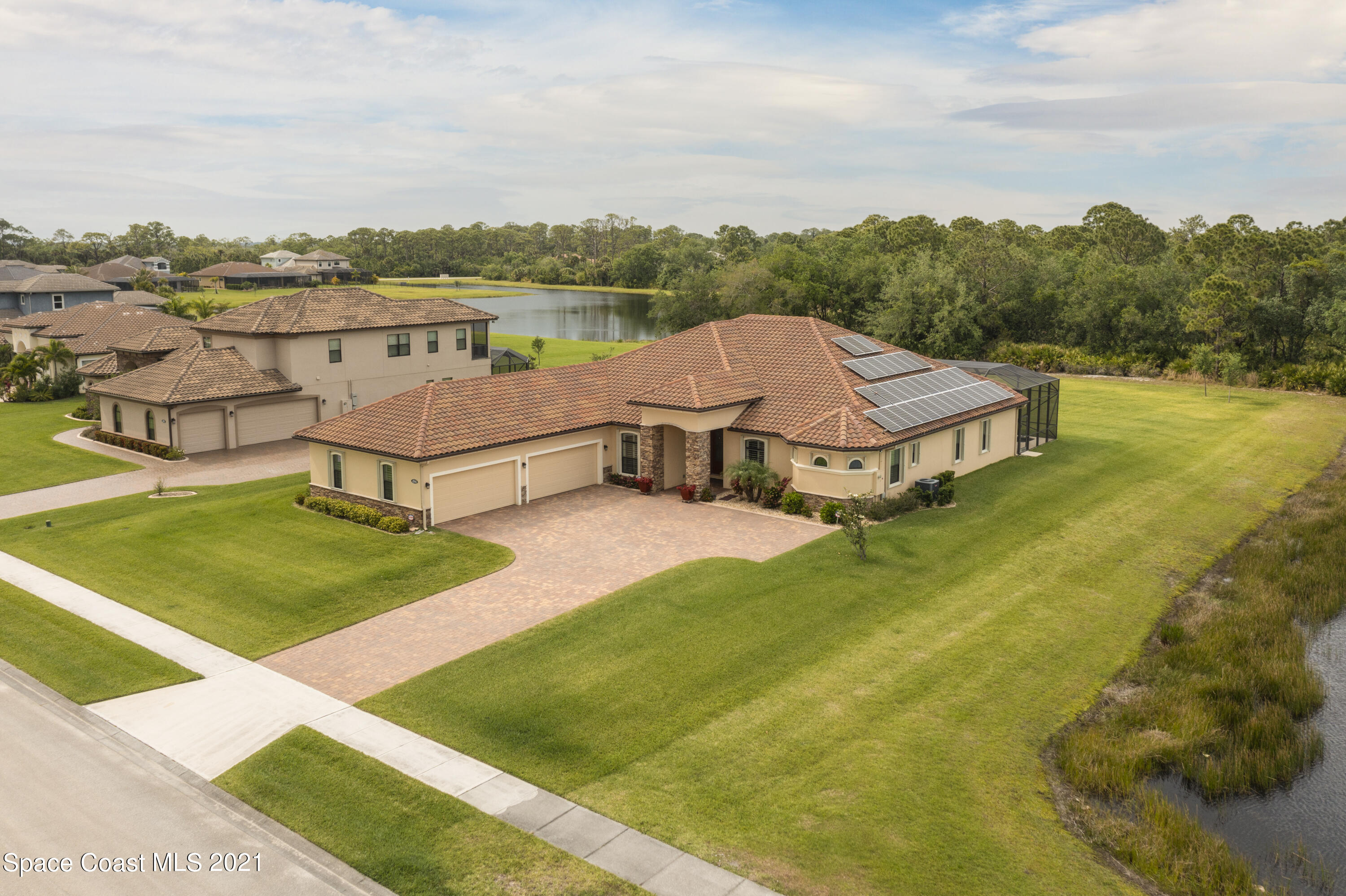 4584 Preservation Circle Melbourne, FL 32934 - Photo 28 of 34 a view of a terrace with a lake view