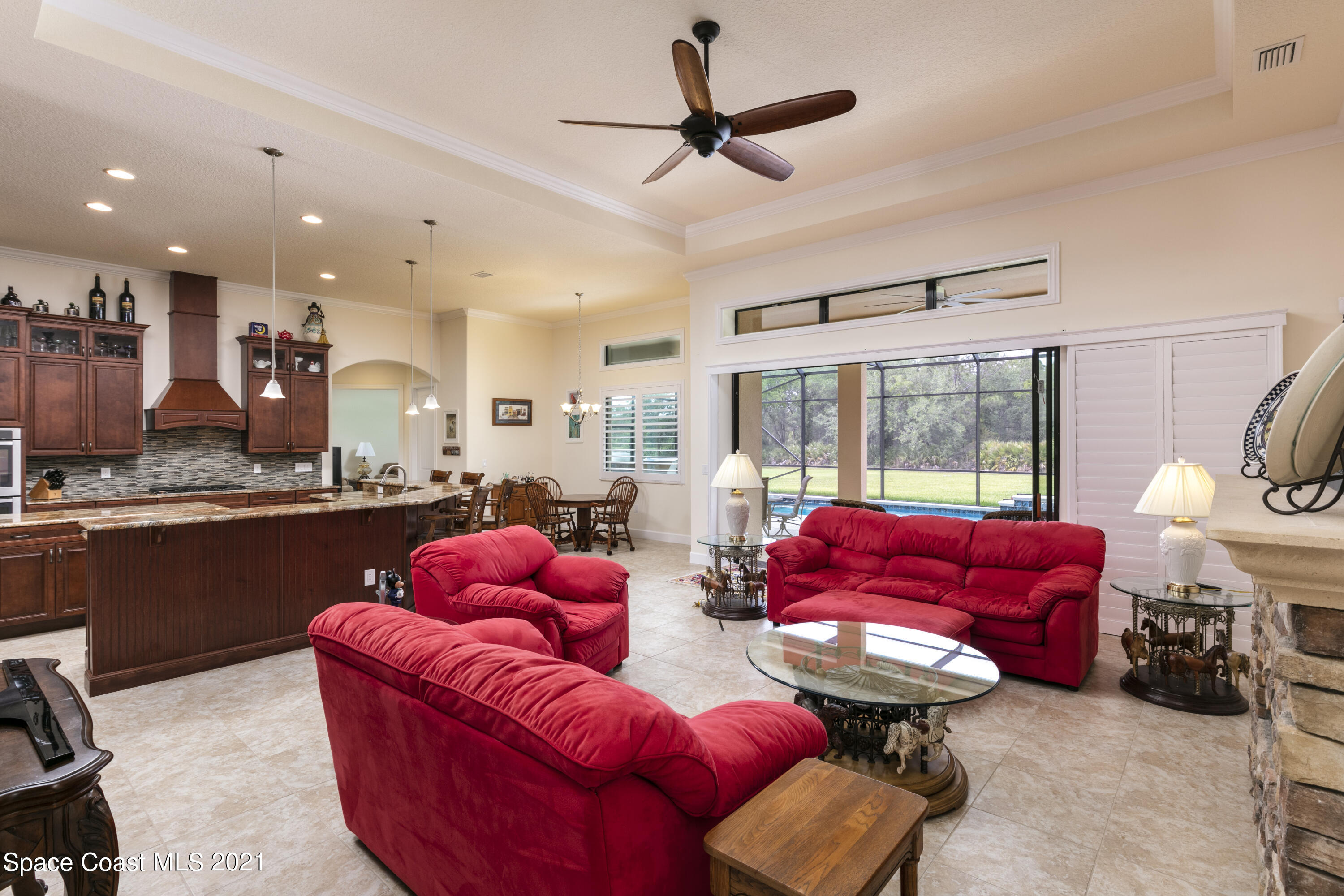 4584 Preservation Circle Melbourne, FL 32934 - Photo 4 of 34 a living room with furniture and a large window