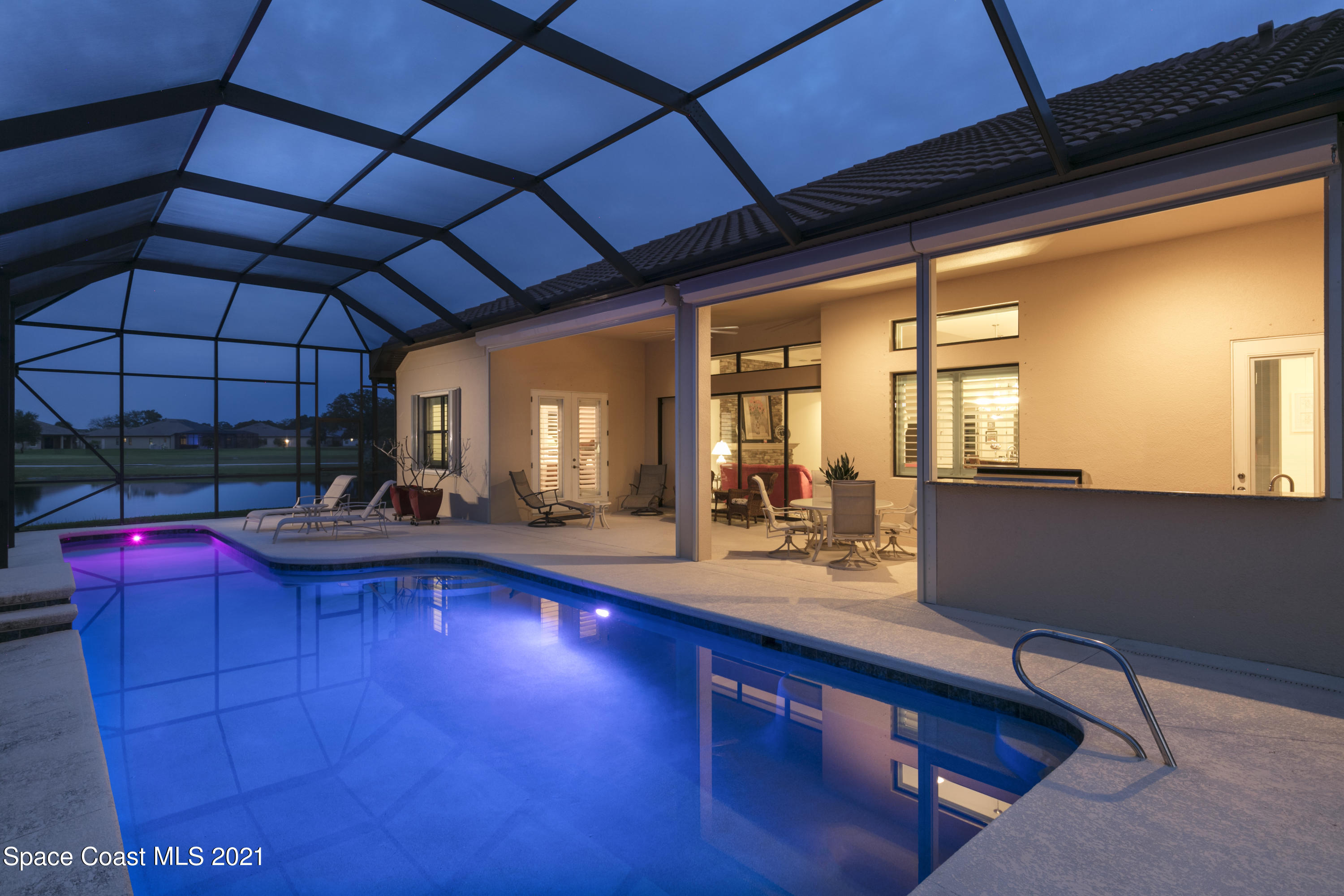 4584 Preservation Circle Melbourne, FL 32934 - Photo 34 of 34 a view of swimming pool with outdoor seating