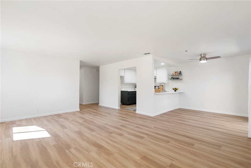 700 West 2nd Street Azusa, CA 91702 - Photo 28 of 75 a view of a kitchen with wooden floor and a kitchen
