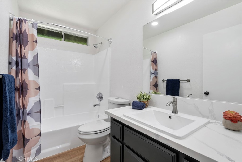 700 West 2nd Street Azusa, CA 91702 - Photo 37 of 75 a bathroom with a sink a toilet and shower