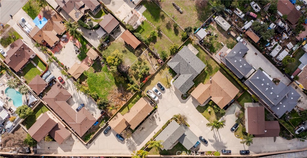 700 West 2nd Street Azusa, CA 91702 - Photo 67 of 75 an aerial view of a house with a yard and wooden fence
