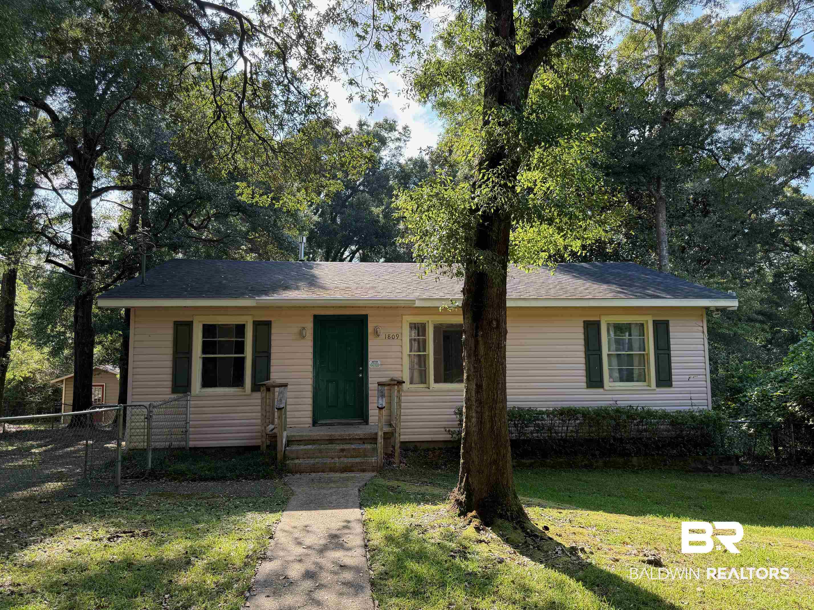 1809 Harris Road Mobile, AL 36618 - Photo 1 of 11 View of front of house featuring entry steps and a shingled roof