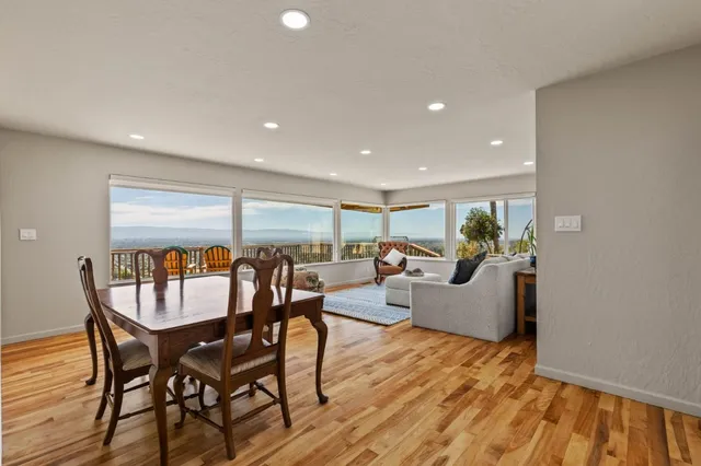 a kitchen with stainless steel appliances kitchen island granite countertop a sink and cabinets