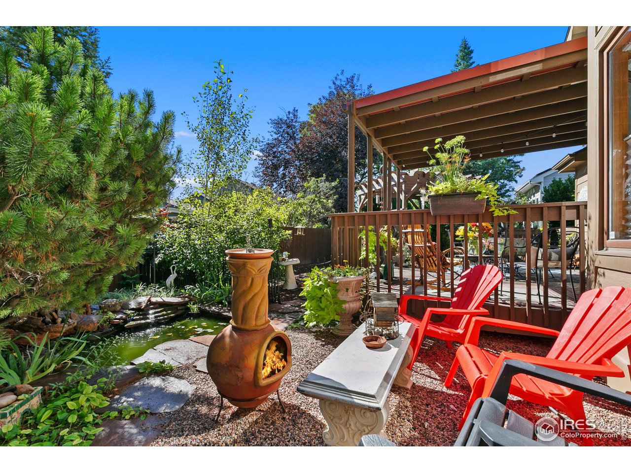 3748 Kentford Road Fort Collins, CO 80525 - Photo 34 of 37 Delightful water feature and Koi pond!