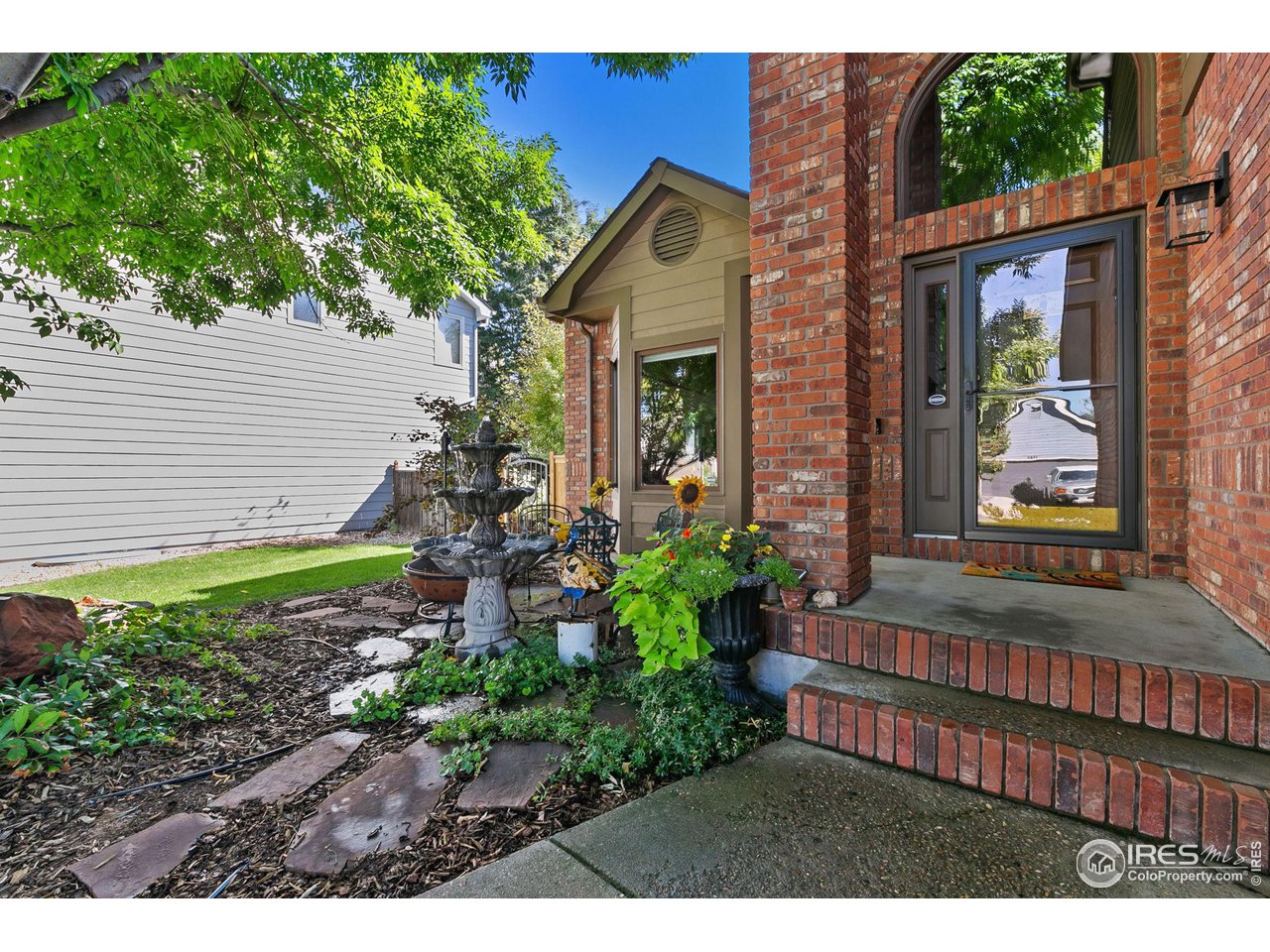 3748 Kentford Road Fort Collins, CO 80525 - Photo 4 of 37 Elegant entry. Fountain included!
